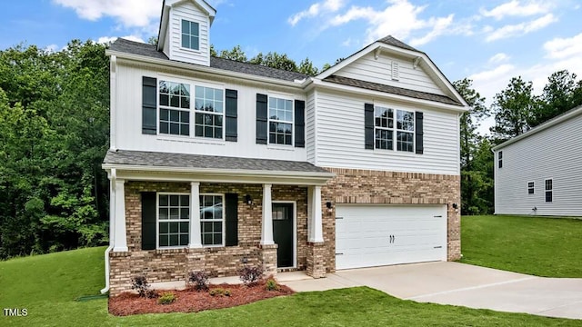 1005 Ocean Ct, Carthage, NC 28327 - view of front facade featuring brick siding, driveway, and a front yard