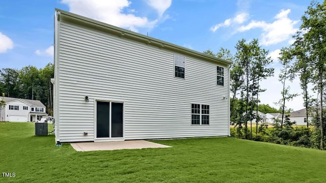 1005 Ocean Ct, Carthage, NC 28327 - rear view of property with a patio and a lawn