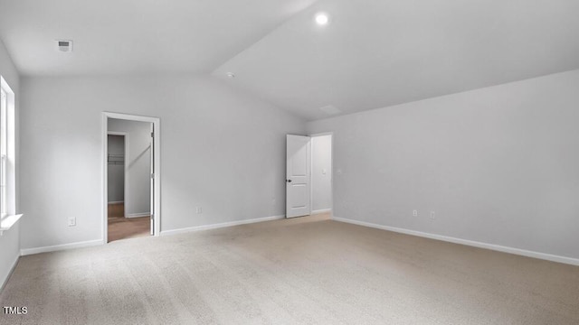 1005 Ocean Ct, Carthage, NC 28327 - unfurnished bedroom with lofted ceiling, a walk in closet, carpet flooring, and a closet