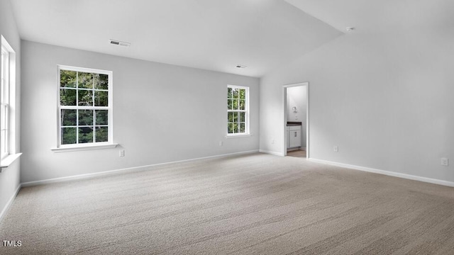 1005 Ocean Ct, Carthage, NC 28327 - carpeted spare room with baseboards and vaulted ceiling
