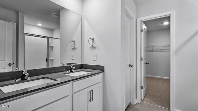 1005 Ocean Ct, Carthage, NC 28327 - full bathroom featuring double vanity, a spacious closet, and tile patterned floors