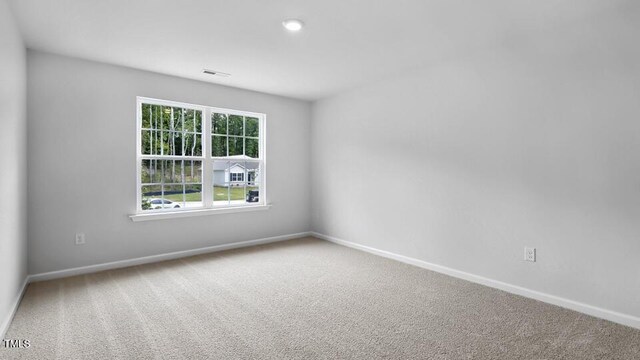 1005 Ocean Ct, Carthage, NC 28327 - spare room with baseboards and carpet
