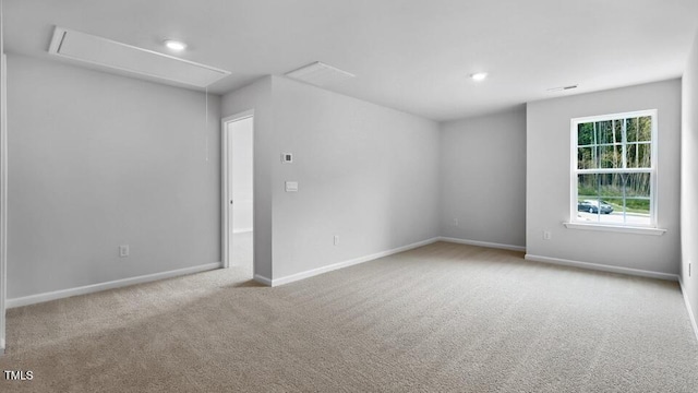 1005 Ocean Ct, Carthage, NC 28327 - spare room featuring attic access and carpet flooring