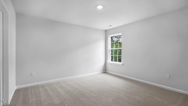 1005 Ocean Ct, Carthage, NC 28327 - carpeted empty room with baseboards