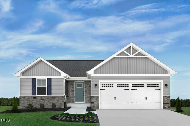 craftsman-style home featuring an attached garage, concrete driveway, a front lawn, stone siding, and board and batten siding