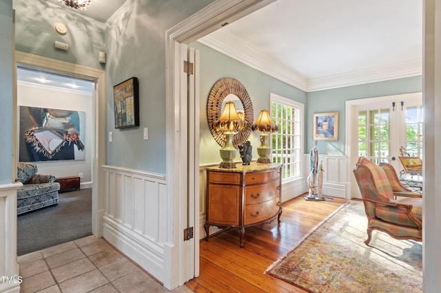 office area featuring crown molding, wainscoting, and french doors