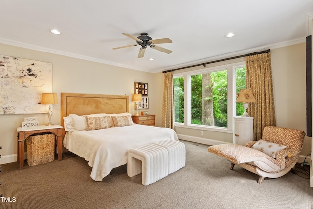 carpeted bedroom featuring ornamental molding, baseboards, recessed lighting, and a ceiling fan