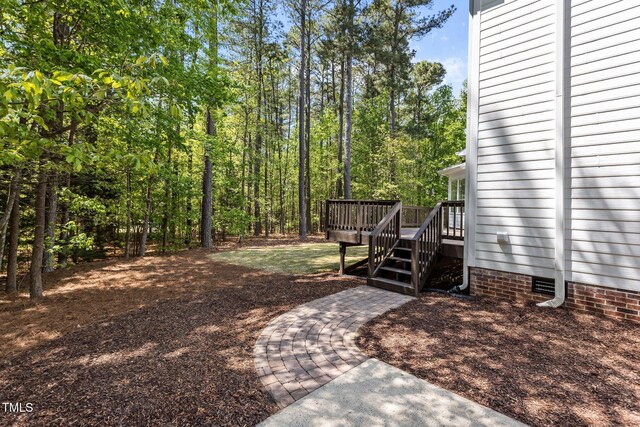 view of yard featuring a deck