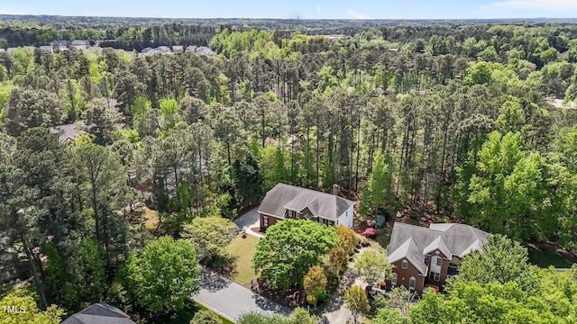 aerial view featuring a forest view