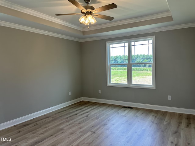 70 Prency Ln, Middlesex, NC 27557 - spare room featuring a tray ceiling, wood finished floors, ornamental molding, and a ceiling fan