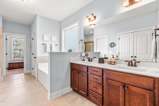 50 Lockamy Ln, Youngsville, NC 27596 - full bath featuring tile patterned flooring, a stall shower, and a sink