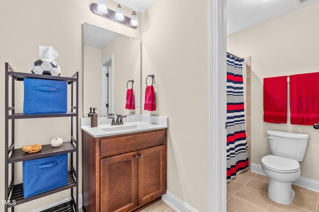 50 Lockamy Ln, Youngsville, NC 27596 - full bathroom featuring visible vents, toilet, tile patterned flooring, baseboards, and vanity