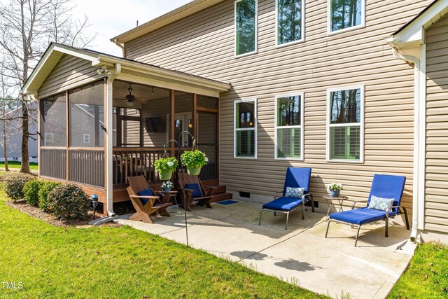 50 Lockamy Ln, Youngsville, NC 27596 - back of property with a yard, a patio area, a sunroom, and crawl space