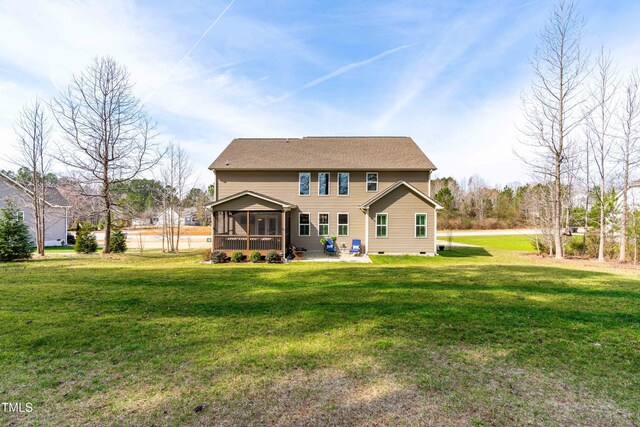 50 Lockamy Ln, Youngsville, NC 27596 - back of property featuring a patio, a yard, a sunroom, and crawl space