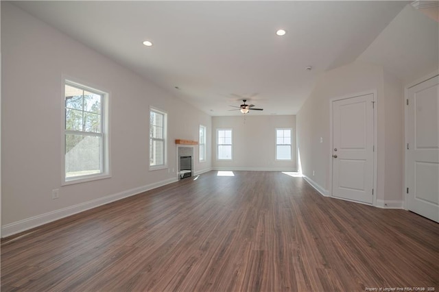 333 Edwinstowe Ave, Fayetteville, NC 28311 - unfurnished living room with dark wood-style floors, ceiling fan, baseboards, recessed lighting, and a glass covered fireplace