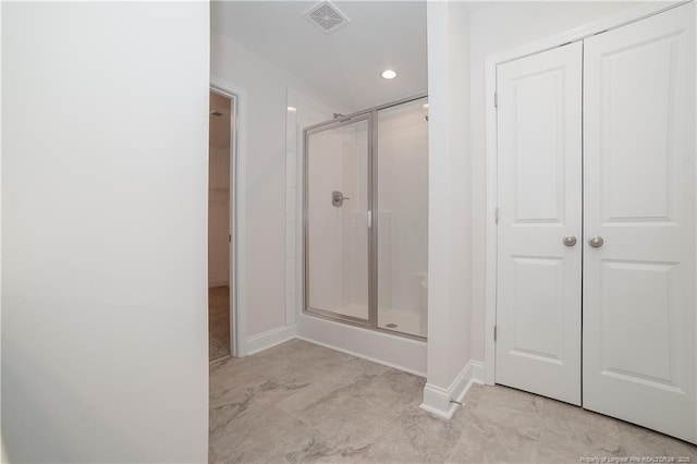 333 Edwinstowe Ave, Fayetteville, NC 28311 - full bathroom featuring a stall shower, baseboards, a closet, recessed lighting, and marble finish floors