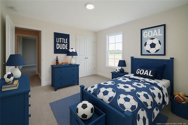 333 Edwinstowe Ave, Fayetteville, NC 28311 - bedroom with light colored carpet, a closet, and baseboards