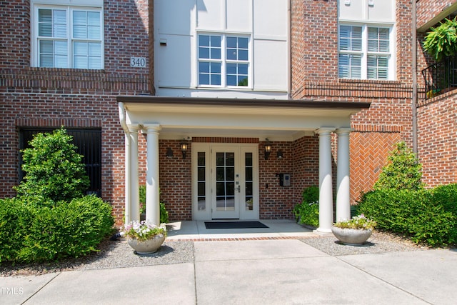 340 Allister Dr Unit 201, Raleigh, NC 27609 - entrance to property with covered porch and brick siding