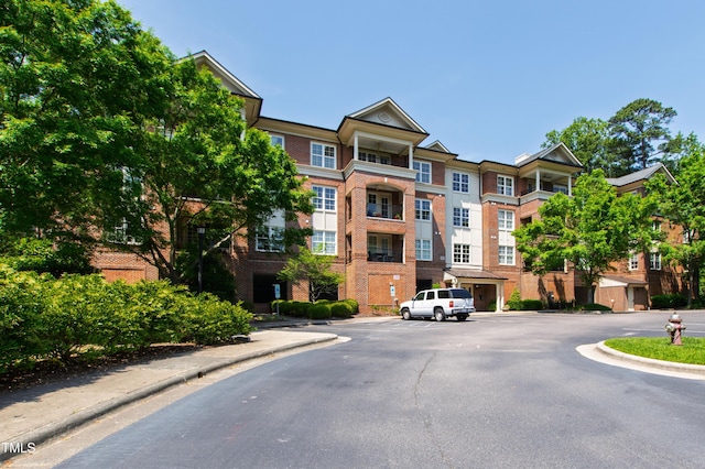 340 Allister Dr Unit 201, Raleigh, NC 27609 - view of property featuring uncovered parking