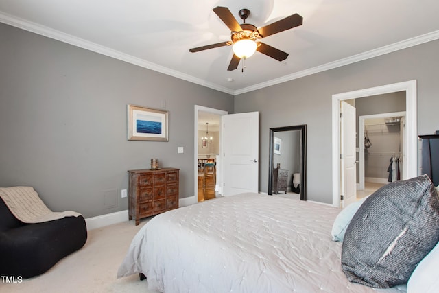 340 Allister Dr Unit 201, Raleigh, NC 27609 - bedroom with light carpet, a ceiling fan, baseboards, a spacious closet, and ornamental molding