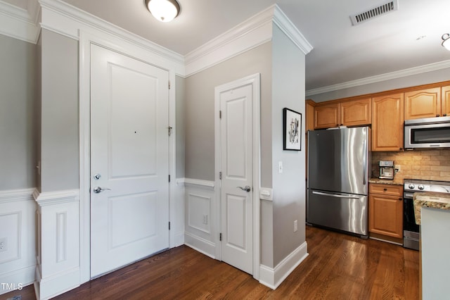340 Allister Dr Unit 201, Raleigh, NC 27609 - kitchen featuring backsplash, visible vents, light stone counters, stainless steel appliances, and dark wood-type flooring