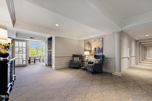 340 Allister Dr Unit 201, Raleigh, NC 27609 - sitting room with decorative columns, a decorative wall, ornamental molding, carpet, and a tray ceiling