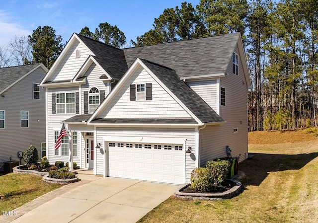 traditional-style home featuring concrete driveway, a front lawn, cooling unit, a garage, and roof with shingles