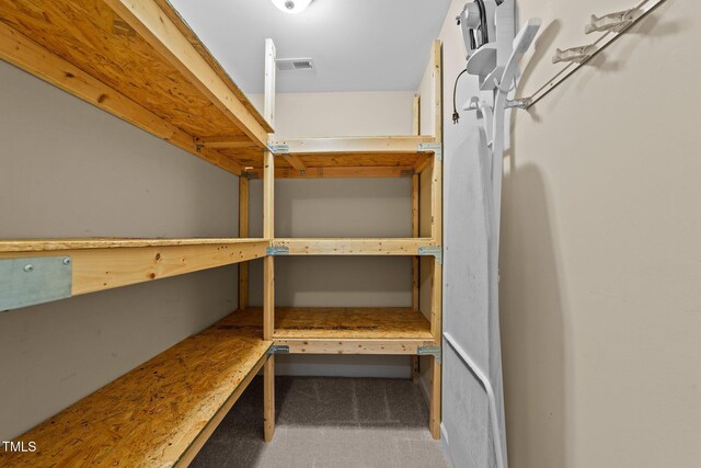 storage room featuring visible vents