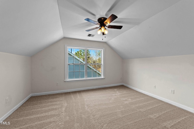 bonus room featuring baseboards, visible vents, lofted ceiling, a ceiling fan, and carpet floors