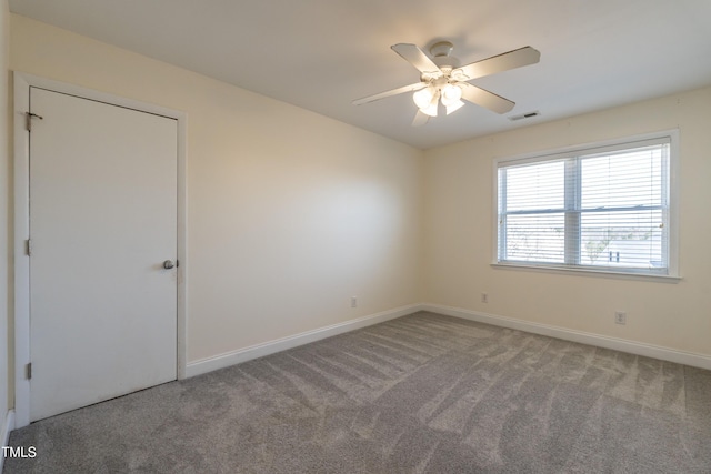 118 Riverwood Dr, Fuquay Varina, NC 27526 - carpeted empty room featuring visible vents, baseboards, and a ceiling fan