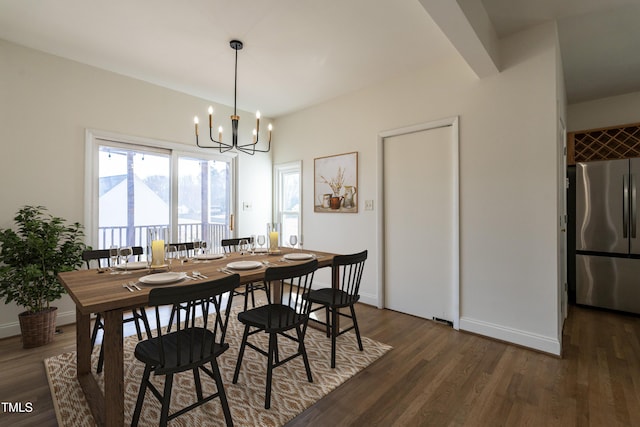 118 Riverwood Dr, Fuquay Varina, NC 27526 - dining space with an inviting chandelier, baseboards, and dark wood-type flooring