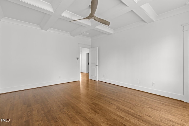 unfurnished room featuring baseboards, wood finished floors, coffered ceiling, and ceiling fan