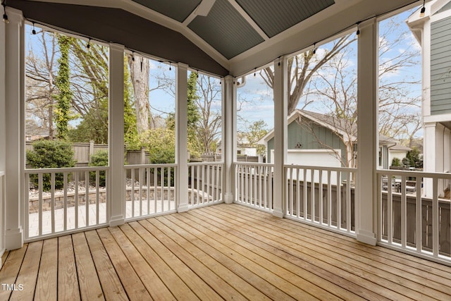 wooden deck with fence and an outdoor structure