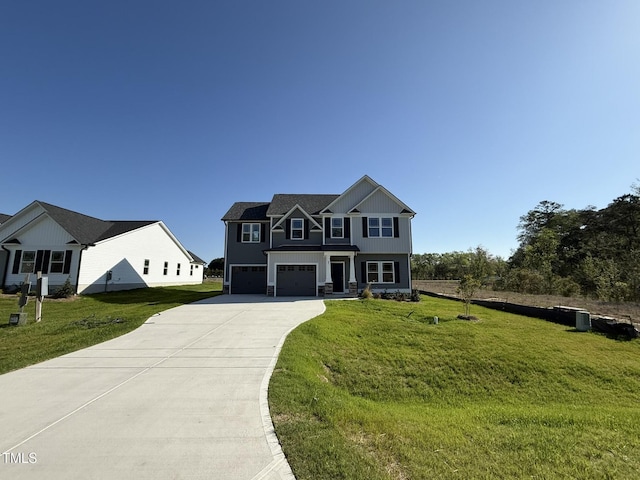 87 Heatherglenn Cir, Princeton, NC 27569 - view of front of house with a front yard, an attached garage, stone siding, and concrete driveway
