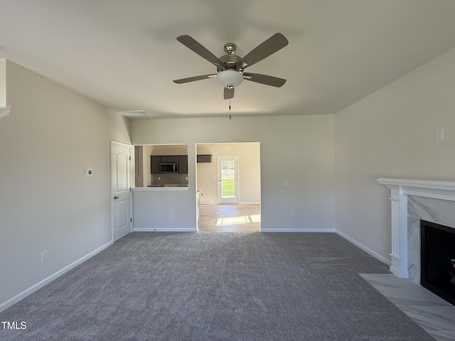 87 Heatherglenn Cir, Princeton, NC 27569 - unfurnished living room with a fireplace, carpet flooring, baseboards, and ceiling fan