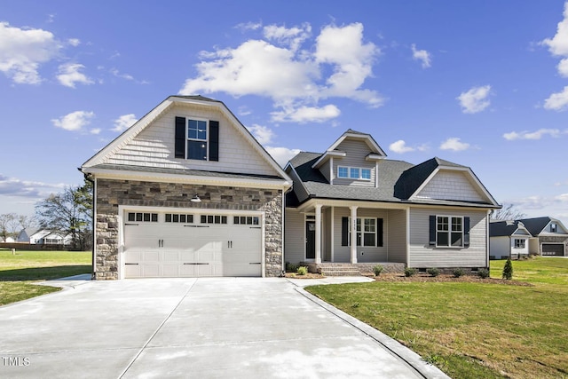 view of front of home featuring crawl space, driveway, a front yard, and covered porch