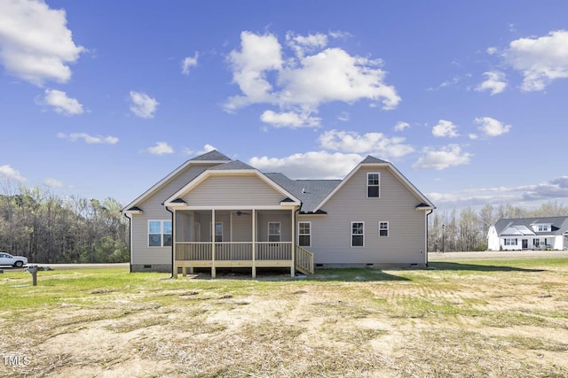 back of property featuring a ceiling fan and crawl space