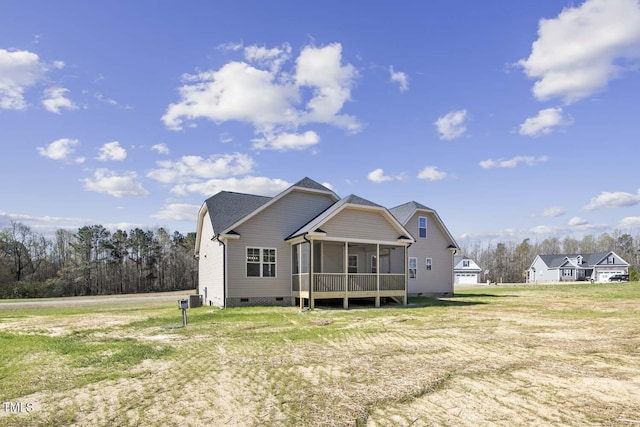back of house featuring a sunroom, crawl space, a shingled roof, and central air condition unit