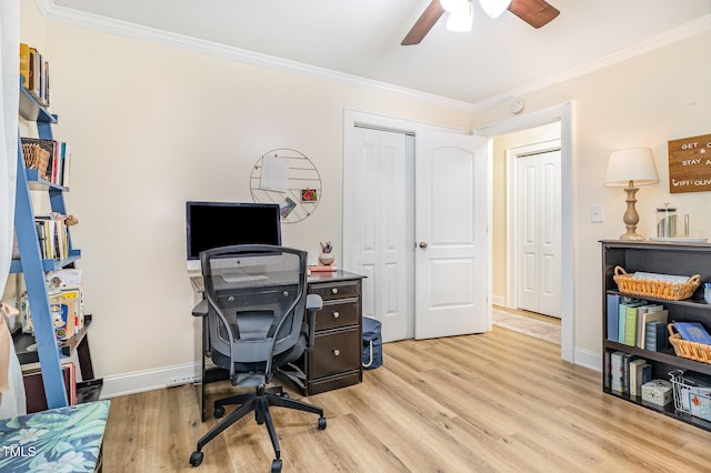 home office featuring light wood-type flooring, a ceiling fan, crown molding, and baseboards