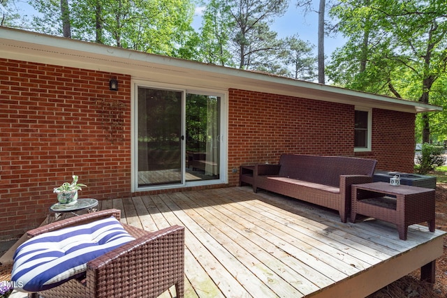 deck with an outdoor living space