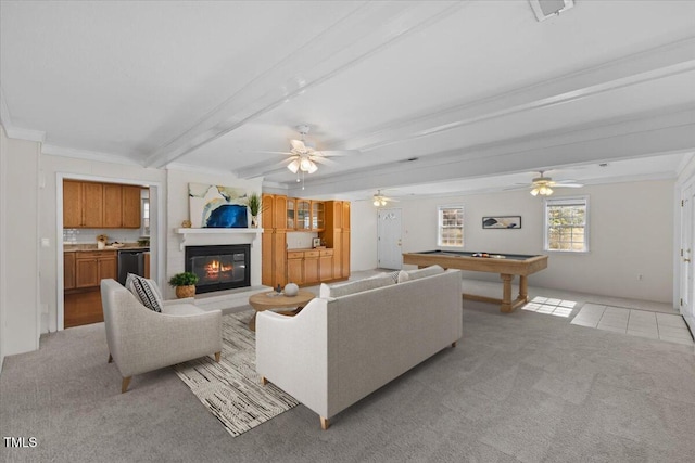 901 Emory Ln, Raleigh, NC 27609 - living room featuring beamed ceiling, light colored carpet, billiards, a glass covered fireplace, and crown molding