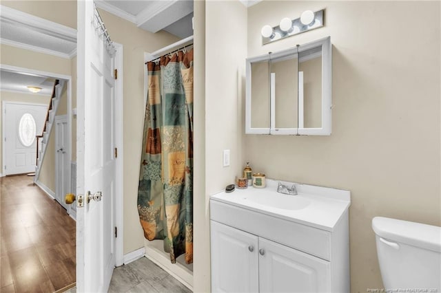 12621 Coble Dr, Laurinburg, NC 28352 - full bath featuring toilet, ornamental molding, and vanity