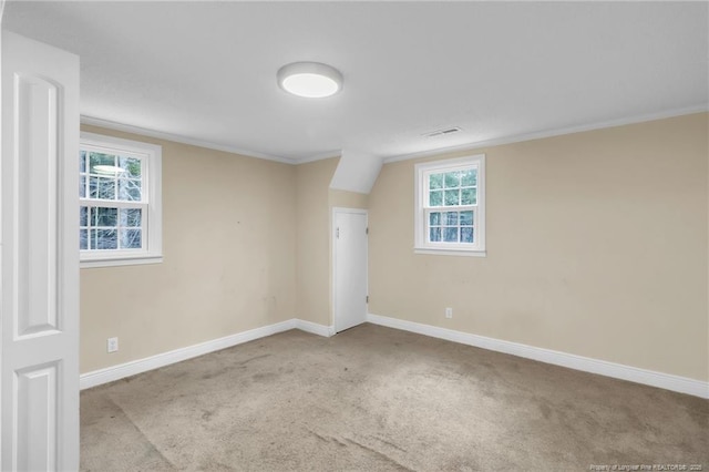 12621 Coble Dr, Laurinburg, NC 28352 - unfurnished room featuring carpet flooring, visible vents, baseboards, and ornamental molding