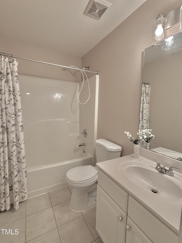 1613 Bulon Dr, Cary, NC 27518 - full bath with toilet, tile patterned floors, vanity, and shower / bathtub combination with curtain