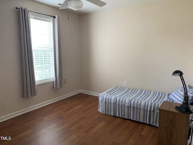 1613 Bulon Dr, Cary, NC 27518 - living area with a ceiling fan, dark wood-type flooring, and baseboards