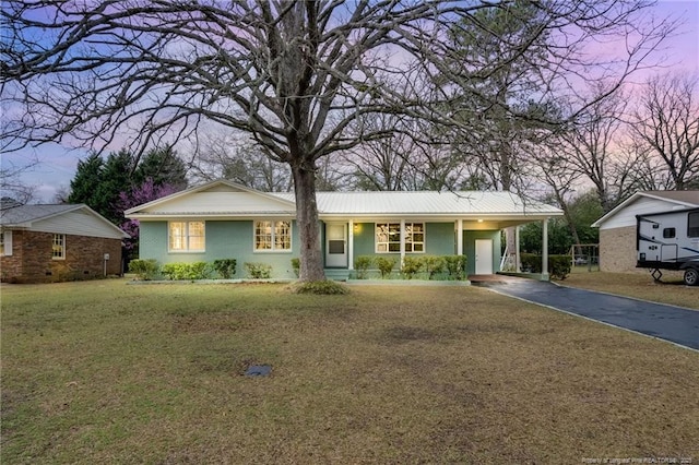 1772 Inverness Dr, Fayetteville, NC 28304 - ranch-style house with an attached carport, concrete driveway, a front yard, and metal roof