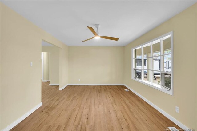 1772 Inverness Dr, Fayetteville, NC 28304 - spare room with light wood-style flooring, a ceiling fan, and baseboards