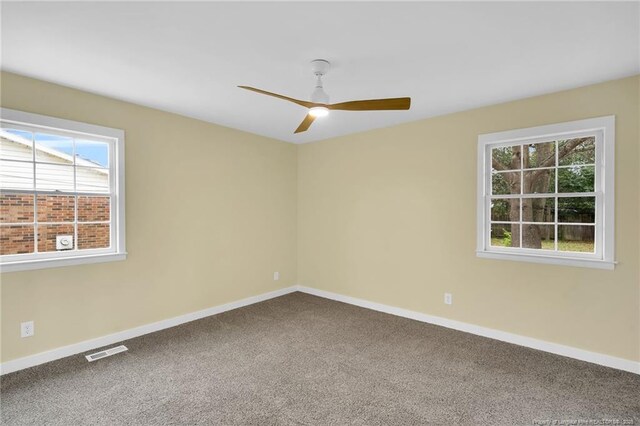 1772 Inverness Dr, Fayetteville, NC 28304 - carpeted empty room with visible vents, a ceiling fan, and baseboards