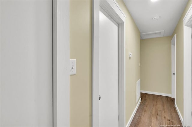 1772 Inverness Dr, Fayetteville, NC 28304 - hallway with attic access, baseboards, and wood finished floors