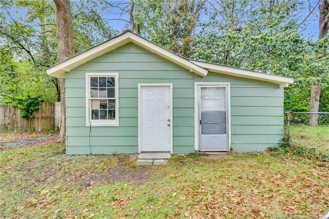 1772 Inverness Dr, Fayetteville, NC 28304 - view of outdoor structure featuring an outbuilding and fence